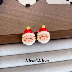 Detail view of cute Santa Claus cartoon stud earrings with dimensions 1.1cm by 2.1cm