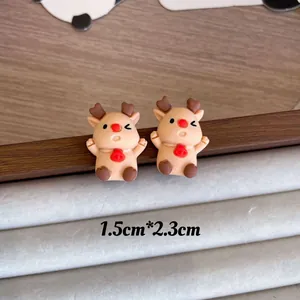 Detailed view of cute cartoon reindeer Christmas earrings measuring 1.5cm by 2.3cm