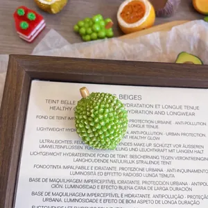 Close-up of cute simulation durian fruit brooch made of resin with size details