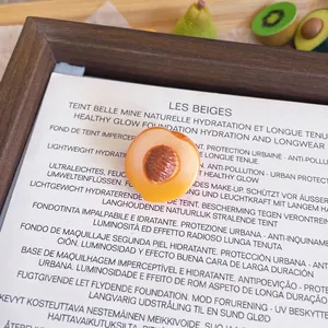 Close-up detail of a cute realistic resin peach fruit brooch showing precise dimensions