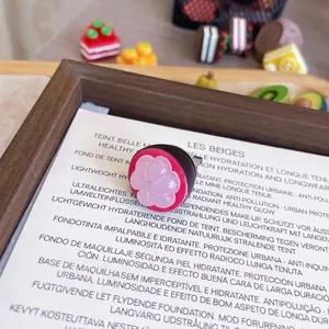 Detailed close-up view of a cute mangosteen-inspired resin fruit brooch pin badge