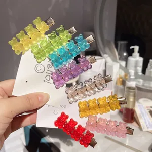 Set of colorful transparent gummy bear hair clips in various vibrant candy colors