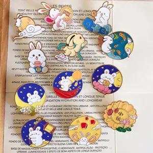 Detail view of cute Chinese style rabbit enamel pins for Mid-Autumn festival