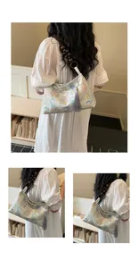 Detailed view of New Chinese style elephant print shoulder bag with wooden beads
