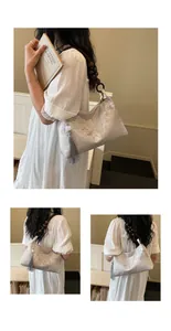 Detailed view of New Chinese style jacquard bag featuring wooden beads and tassel