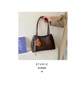 Vintage brown Maillard faux leather tote bag with cute bear charm and long handles