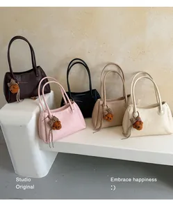 Selection of retro Maillard style tote bags with cute bear charms in various colors