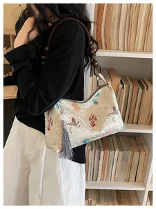 Neo-Chinese style underarm bag featuring jacquard butterfly pattern and wooden bead strap