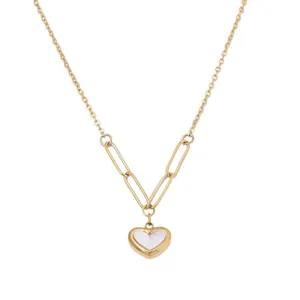 Close-up detail of 18k gold plated stainless steel heart necklace with mother of pearl
