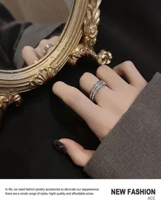 Close-up of a sparkling full stone ring in silver titanium steel finish