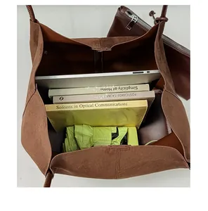 Internal top-down view showing large capacity of vintage brown suede commuting tote bag