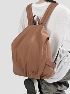 Casual brown nylon backpack for women with large capacity and lightweight design