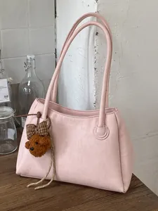Elegant minimalist pink tote bag for women with large capacity and cute teddy bear charm