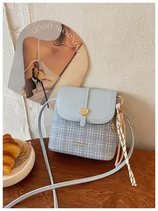 Stylish light blue checkered crossbody bag with heart buckle for modern women's fashion