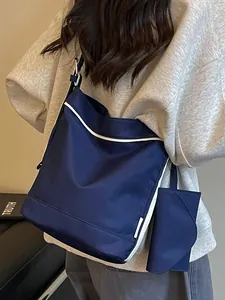 Stylish Korean navy canvas tote bag with white piping and a matching small pouch