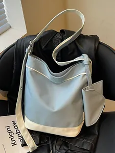 Large capacity light blue and white color-contrast canvas tote bag with matching pouch