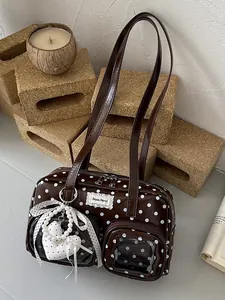 Vintage brown polka dot underarm shoulder bag with cute charms and lace patch