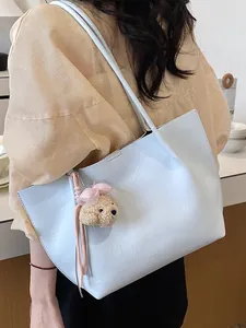 Elegant light blue large capacity tote bag with cute bear charm for women's daily commute