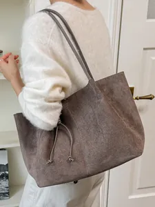 Large capacity vintage suede tote bag for women commuting in stylish brown color