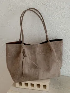 Large minimalist retro taupe suede tote bag with knot detail for daily commute