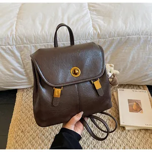 Dark brown soft leather backpack for women, perfect for casual daily commute.
