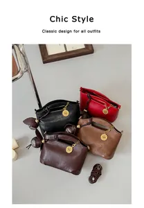 Chic women's crossbody handbags in four classic colors with gold charms