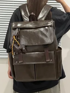 Sac à dos décontracté en similicuir marron pour femmes avec un joli charm de chien