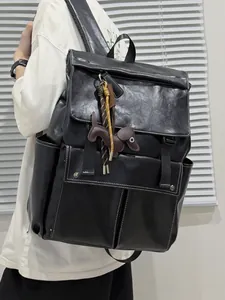 Sac à dos en cuir noir mode pour femme sac de voyage élégant avec breloque chien