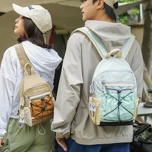 Zaino leggero in nylon impermeabile per viaggi e scuola, disponibile in color cachi e azzurro
