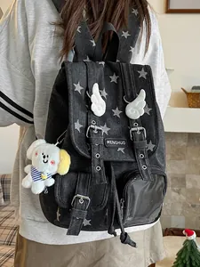 Retro denim star print backpack with wing details and a cute plush dog charm accessory