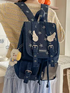 Vintage denim star pattern backpack with wing accents and cute plush bear charm