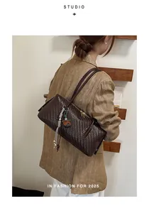 Elegant dark brown woven pillow bag for women with a retro shoulder commuter style design