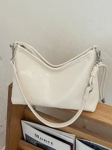 Borsa a tracolla minimalista bianco crema con tracolla regolabile per donna trendy