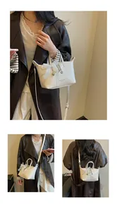 Detailed views of high-end white woven tote bag with lace bow worn as crossbody and shoulder bag
