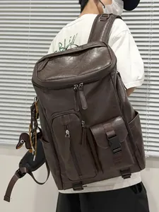 Vintage large capacity brown faux leather backpack shown on a model for commuting