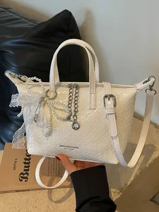 Elegant white woven tote bag for women with pearl lace and silver chain decoration