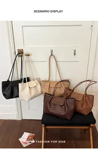 Detailed scenario display of large capacity woven tote bags in various colors for women.