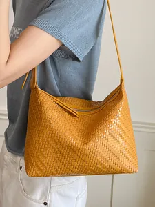 Elegant yellow woven underarm shoulder bag for women summer fashion commute style