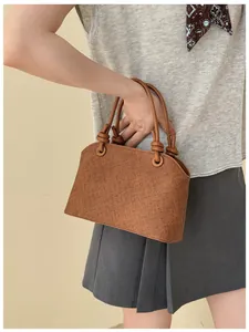 Sac seau texturé marron exquis avec détail de poignée nouée élégant pour les femmes