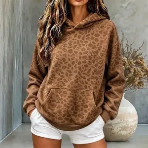 Stylish oversized brown leopard print hoodie for women featuring a cozy hood and front pocket