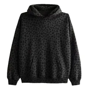Trendy oversized black leopard print hoodie for a casual and fashionable street style.