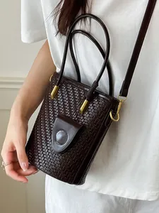 Elegant dark brown woven bucket bag for women, versatile crossbody and handheld style