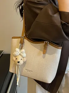 Elegant woven tote bag for women, large capacity commuter shoulder bag with bear charm