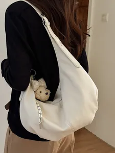 Stylish minimalist white pleated hobo shoulder bag for women with a slouchy dumpling shape