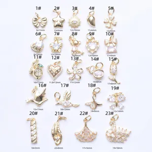 Collection of 23 gold-plated 14K charms with cubic zirconia for DIY jewelry making