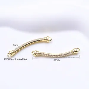 Detailed view of 39mm gold plated curved connector with CZ and 3mm closed rings