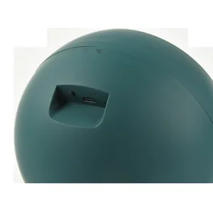 Close-up of USB-C charging port and lock icons on dark green automatic watch winder