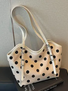Bolso tote vintage de lona con lunares, gran capacidad y correas blancas ajustables.