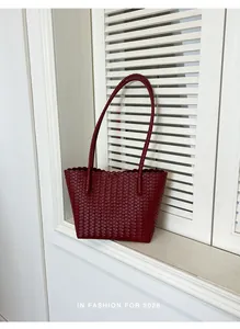 Vintage dark red woven leather tote bag with large capacity for daily commuting