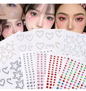 Detailed macro shot of diverse star and heart crystal face rhinestone stickers.
